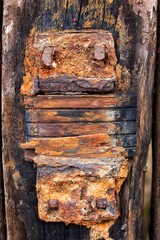 Close up of old weathered railway sleeper fastening - 775084047