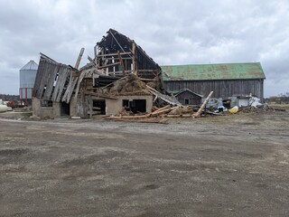 A falling barn with a hole in the roof © Matt
