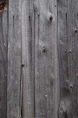 Texture of old weathered rough wooden fence