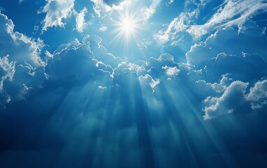 A clear sky dotted with fluffy white clouds. The sunlight filters through the clouds, casting a warm glow over the landscape. The scene radiates tranquility and serenity.