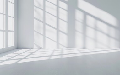 Minimal abstract grey and white backdrop for presentation your product. Background with play of light and shadows from windows on plaster wall in the empty cozy room.
