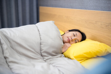 Woman sleep on the bed at home