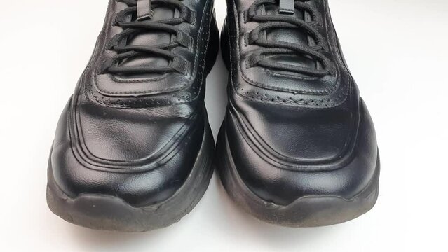 Men's casual sneakers. Leather black sports sneakers.