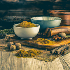 CUMIN POWDER GROUND on wooden table background. Herbs, spices and dried food baking ingredient....