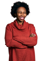 African american woman with afro hair with arms crossed gesture winking looking at the camera with sexy expression, cheerful and happy face. - obrazy, fototapety, plakaty