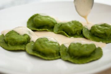 Italian Green Ravioli with white sauce