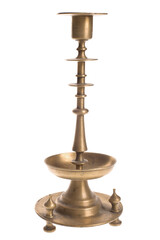 Antique metal candelabra for candles on a white background