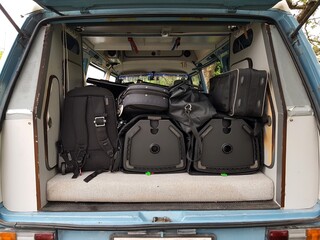 The instruments in the cases are loaded into the van and we are ready to go.