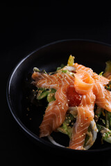 Japanese salad isolated in black background - 775119270