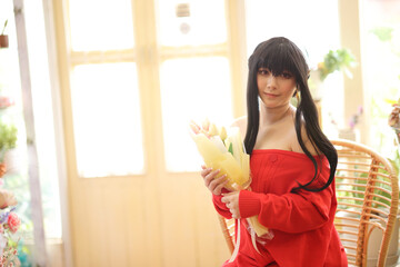 Portrait of a beautiful young woman Cosplay with red sweater - 775120613