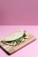 Italian cuisine , Piadina with tomatoes and cheese - 775121690