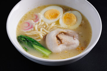 Ramen Japanese noodle isolated in black background - 775121891