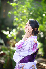 portrait woman with yukata dress in the garden - 775122075