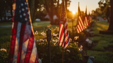 war veterans cemetery with flags of the United States with the sun in the background in high...