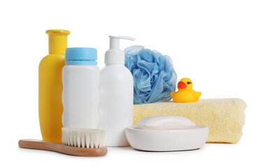 Baby cosmetic products, bath duck, brush and towel isolated on white