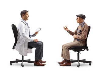 Elderly man and a young male doctor sitting and talking