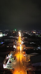 Aerial view of night road traffic in downtown Gorontalo, Indonesia