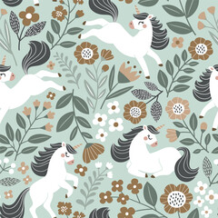 Seamless vector pattern with cute hand drawn unicorns on floral background. Perfect for textile, wallpaper or print design.