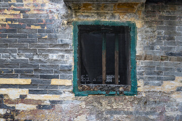 Fototapeta na wymiar Background image of windows on abandoned retro brick walls