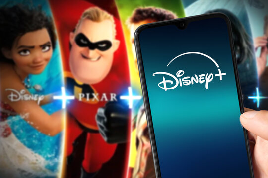 Smartphone with new Disney Plus logo with Disney Plus content on background, 3 Mar, 2024, Sao Paulo, Brazil.