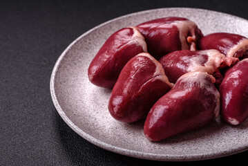 Raw turkey or chicken hearts with salt and spices