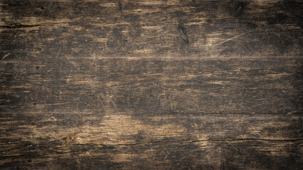 Old brown rustic dark grunge grain wooden timber hardwood wall or floor or table texture - wood background banner with vignette