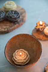 Candles in the form of colorful flowers