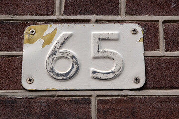 Close Up House Number 65 At Amsterdam The Netherlands 20-3-2024