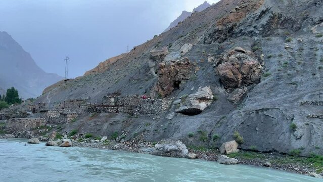 Old villages in Tajikistan. Tajikistan's road along the Zeravshan River near the Pamir highway. Old stone villages in the mountains of the Silk Road. 4К
