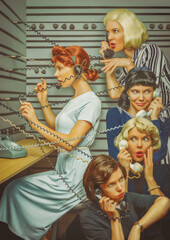 Vintage scene of four women from the 1950s gossiping on the phone, their handset connected to a...