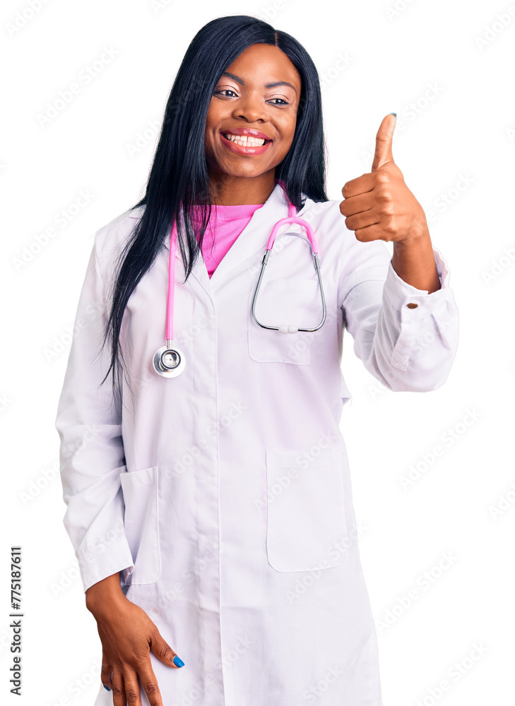 Canvas Prints Young african american woman wearing doctor stethoscope looking proud, smiling doing thumbs up gesture to the side