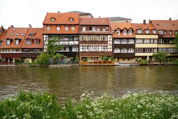 ancient and quaint city of Bamberg on the river Regnitz 
on an overcast spring day (Bamberg, Bavaria, Germany)	