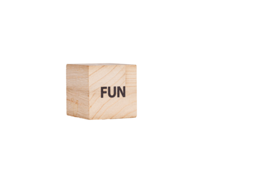 wooden cubes with the inscription Fun on a white isolated background close-up