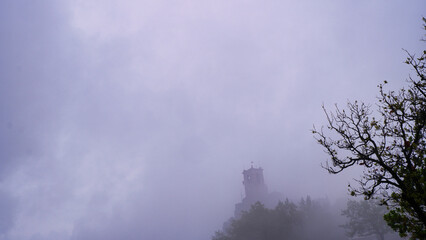San Marino Castle Tower in the Mist - obrazy, fototapety, plakaty