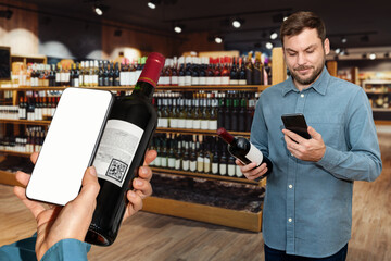 Customers in a wine store scan e-label of wine bottles and reading information about wine using...