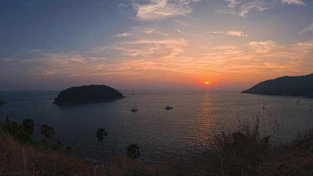Time-lapse video of sunset against the backdrop of the sea, the movement of clouds