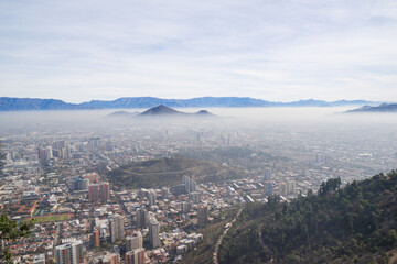 Beautiful landscape of downtown of Santiago city from above. This Chilean capital is one of the largest cities in the Americas. Same like Australia as its summer time will be winter somewhere