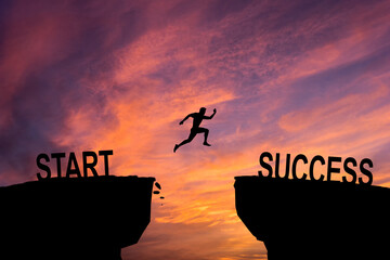 Man jump across text start to success over cliff on sunset background Business strategy concept