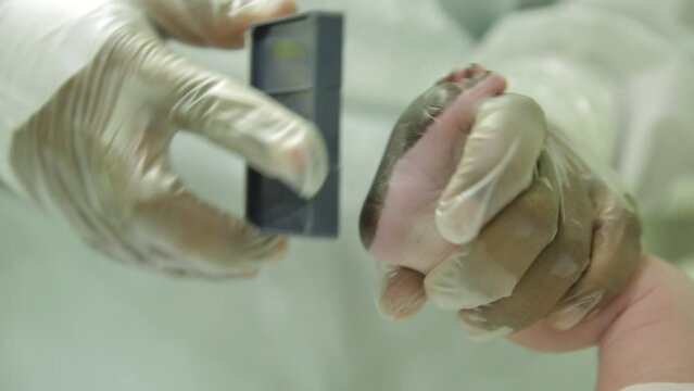 registering newborns with feet in the maternity ward