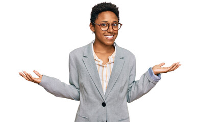 Young african american woman wearing business clothes smiling showing both hands open palms,...