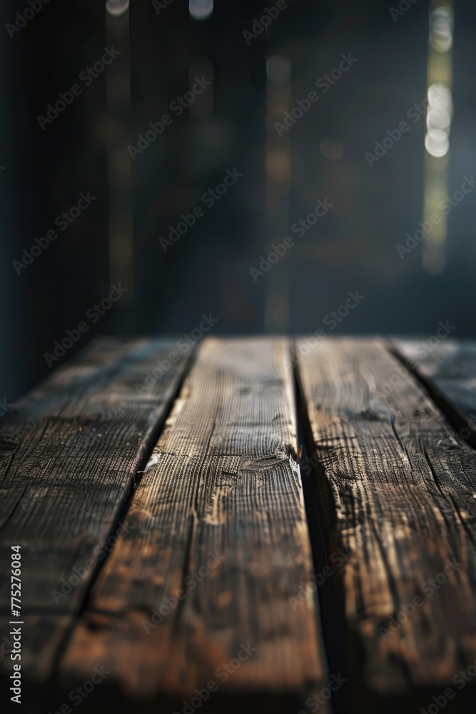 Poster close up of a wooden table in a dark room. suitable for interior design concepts