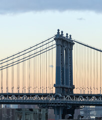 manhattan bridge detail at sunset (suspension bridge between downtown new york city and brooklyn,...