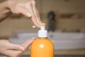 A Hands with soap are washed under the tap with water. Clean from infection and dirt and virus. At...