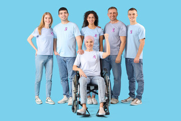 Mature woman in wheelchair and people with lavender awareness ribbons on blue background. World...
