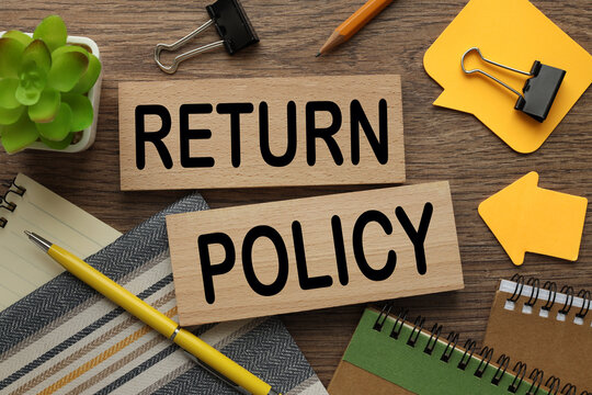 return policy bright sticker points to text on blocks