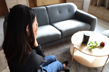 Grieving young woman crying at funeral, closeup