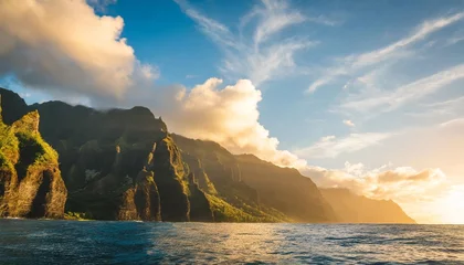 Poster na pali coast kauai hawaii view from sea sunset cruise tour nature coastline landscape in kauai island hawaii usa hawaii travel copy space on blue sky with clouds background © joesph