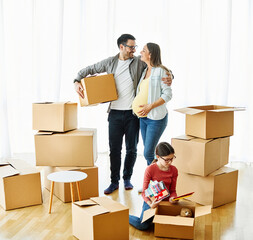 child family box home house moving happy apartment pregnant mother father daughter relocation new...