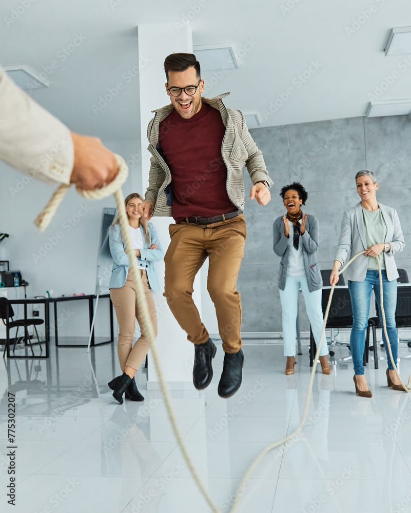 Wall mural business meeting businesswoman businessman office happy teamwork colleague game fun team colleague jumping rope playing workplace friend sport entertainment recreation break