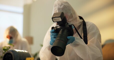 Camera, forensics and investigation of evidence at crime scene for case, photography and...